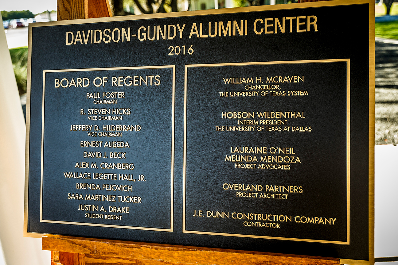 This commemorative plaque, created for permanent display in the alumni center, was unveiled for the ribbon-cutting ceremony.