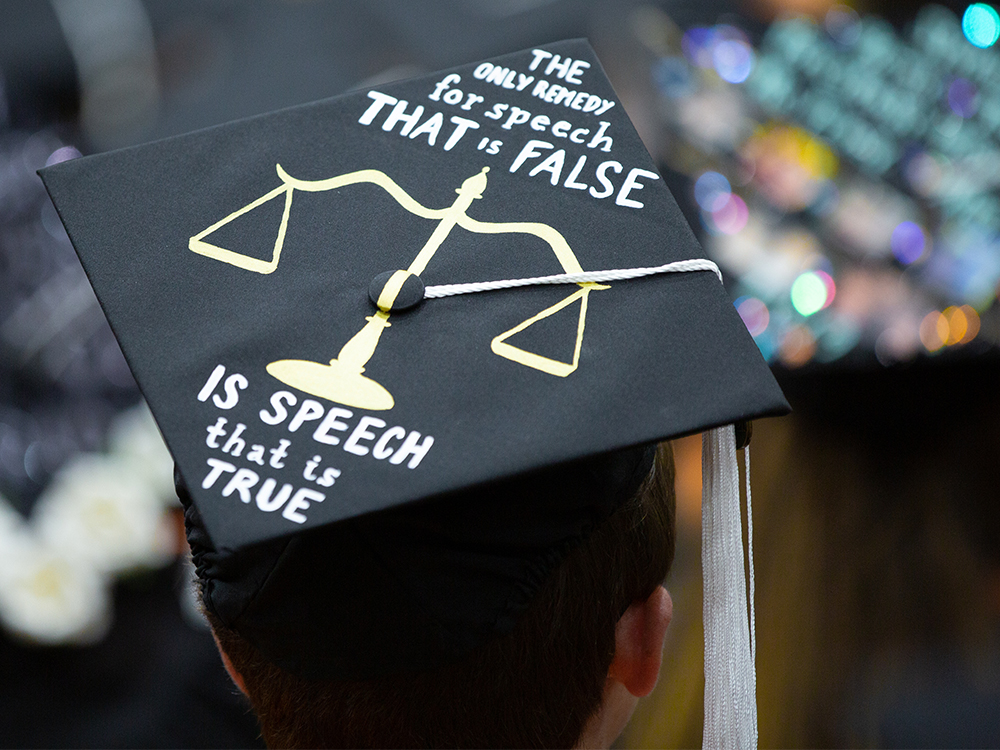 Graduation cap that reads the only remedy for speech that is false is speech that is true