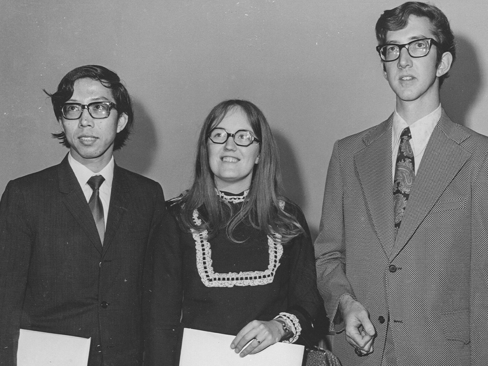 Black and white photos of three graduates