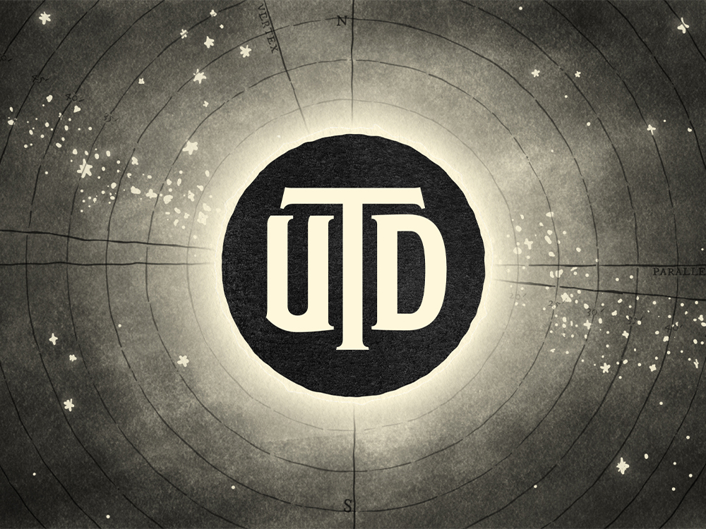 An illustration of a total solar eclipse with the UTD monogram in the center of the dark circle on top of a vintage, sepia star chart