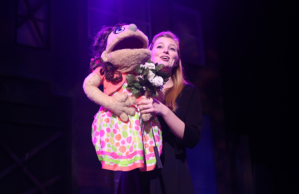 Ali Peterkort played Kate Monster, a kindergarten teaching assistant who lives on Avenue Q.